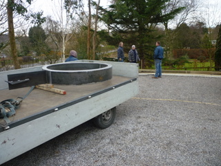 steel sculpture delivered on flat bed truck for front garden makeover landscaping contemporary garden design 